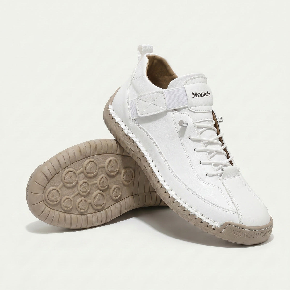 High-top lace-up sneakers with elastic ankle straps and textured flat soles