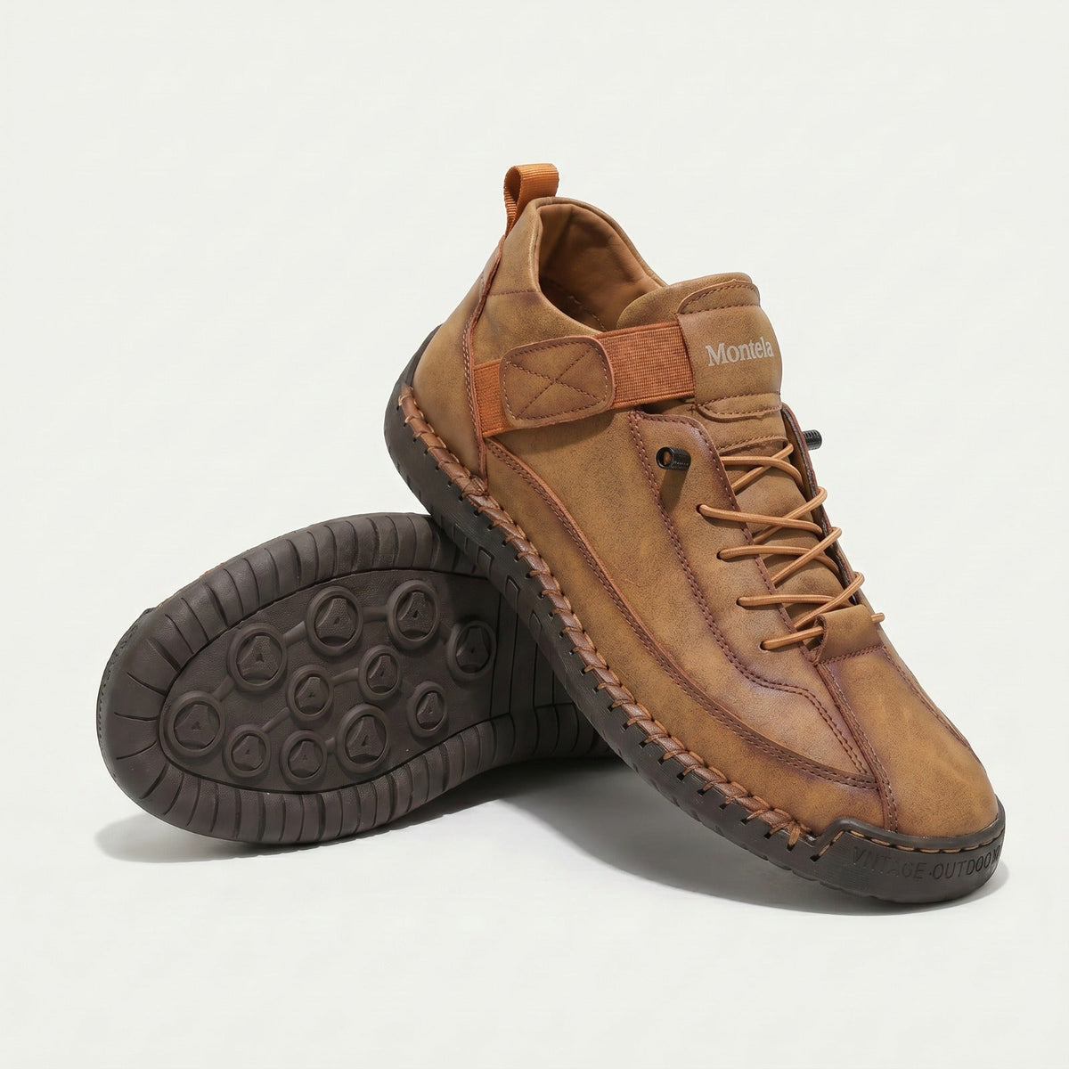 High-top lace-up sneakers with elastic ankle straps and textured flat soles