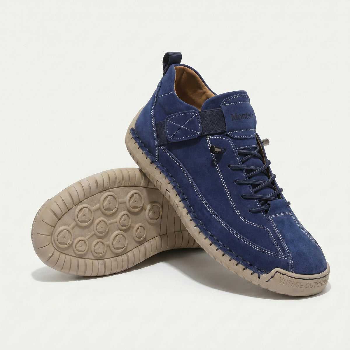 High-top lace-up sneakers with elastic ankle straps and textured flat soles