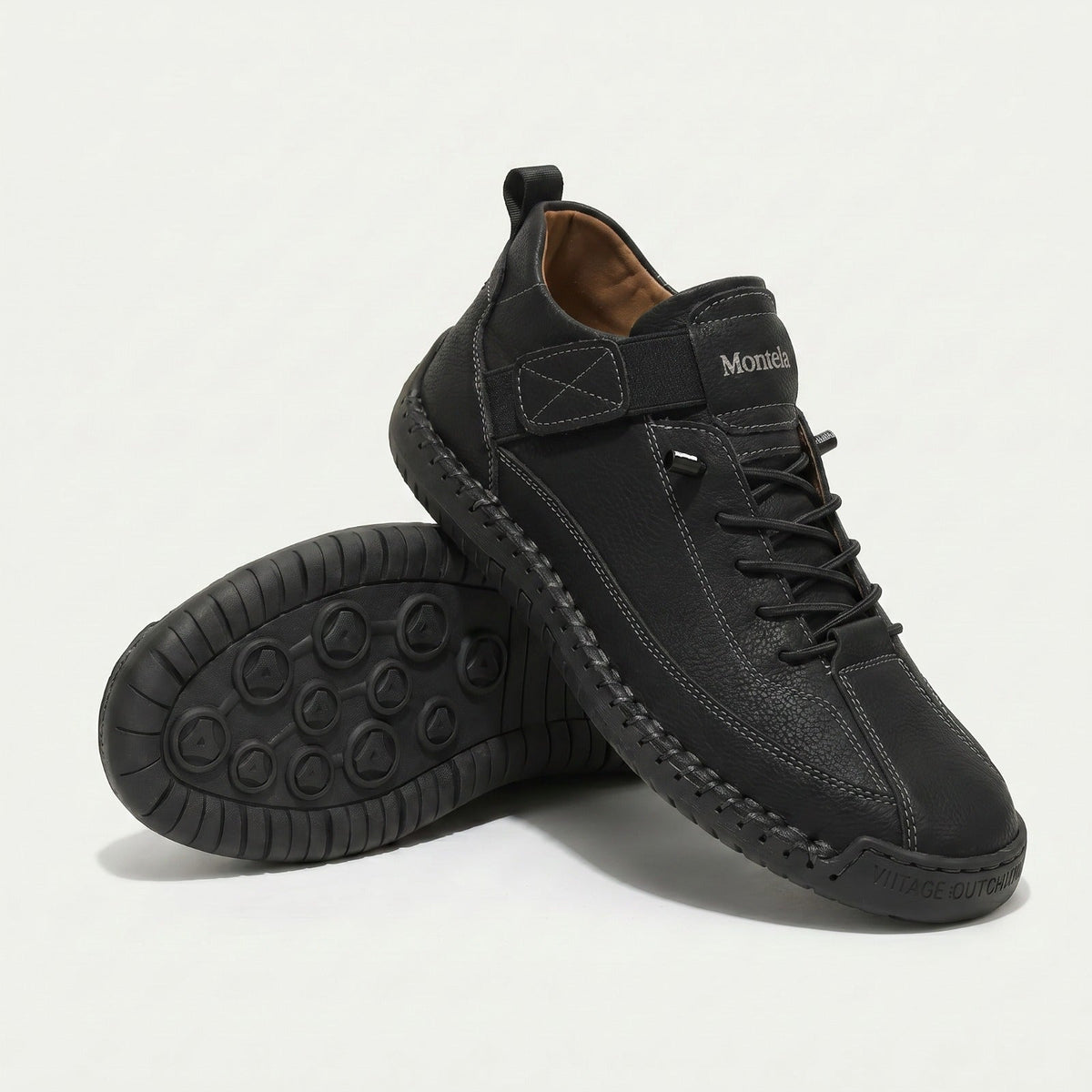 High-top lace-up sneakers with elastic ankle straps and textured flat soles