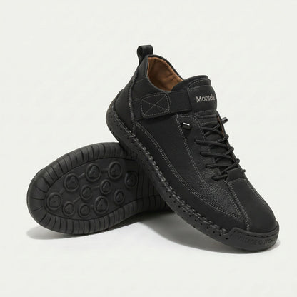 High-top lace-up sneakers with elastic ankle straps and textured flat soles