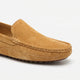 Men's slip-on moccasin loafers with stitched trim and ridged soles