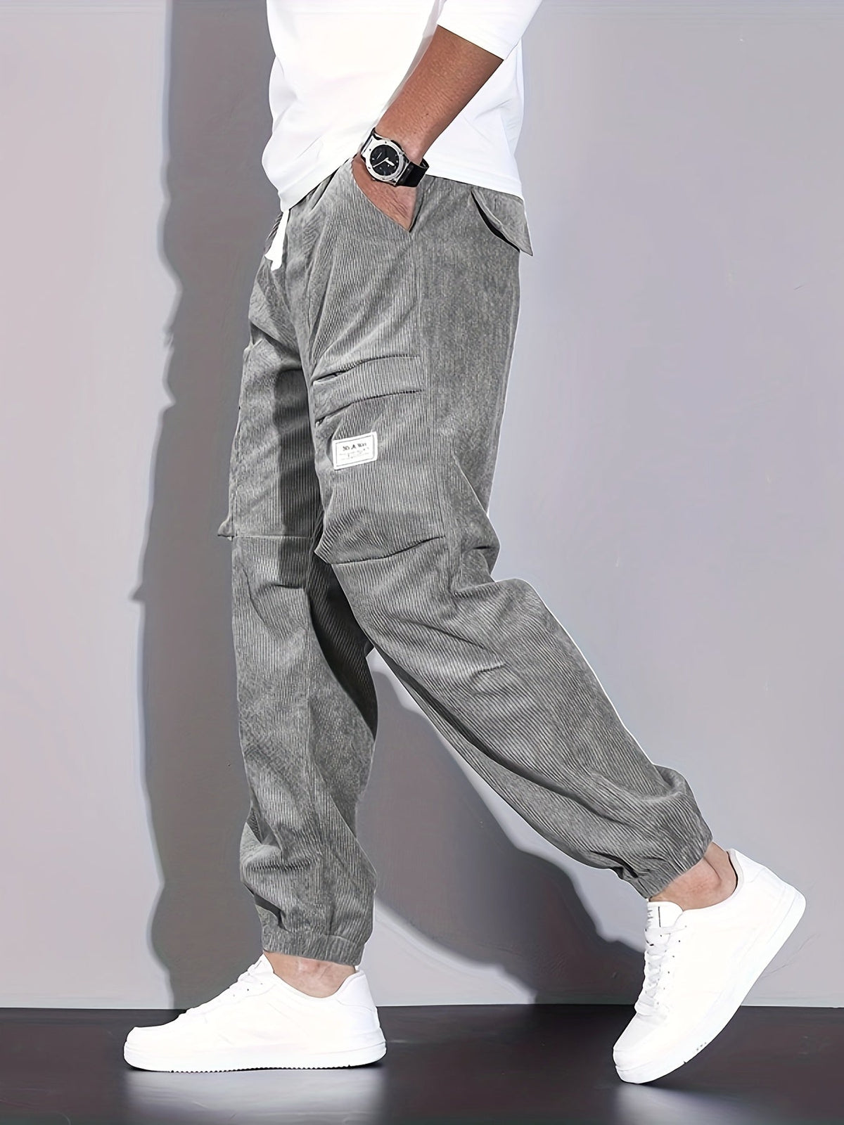 Men's corduroy cargo trousers with tapered legs and elasticated cuffs
