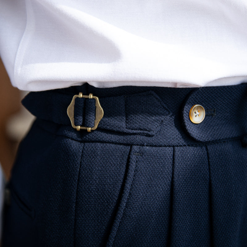 Men's double pleat trousers with side tabs and cuffed hems