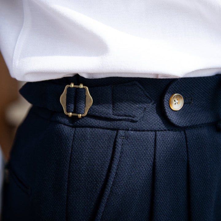 Men's double pleat trousers with side tabs and cuffed hems