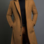 Men's tailored longline trench coat with lapels, buttons and angled side pockets