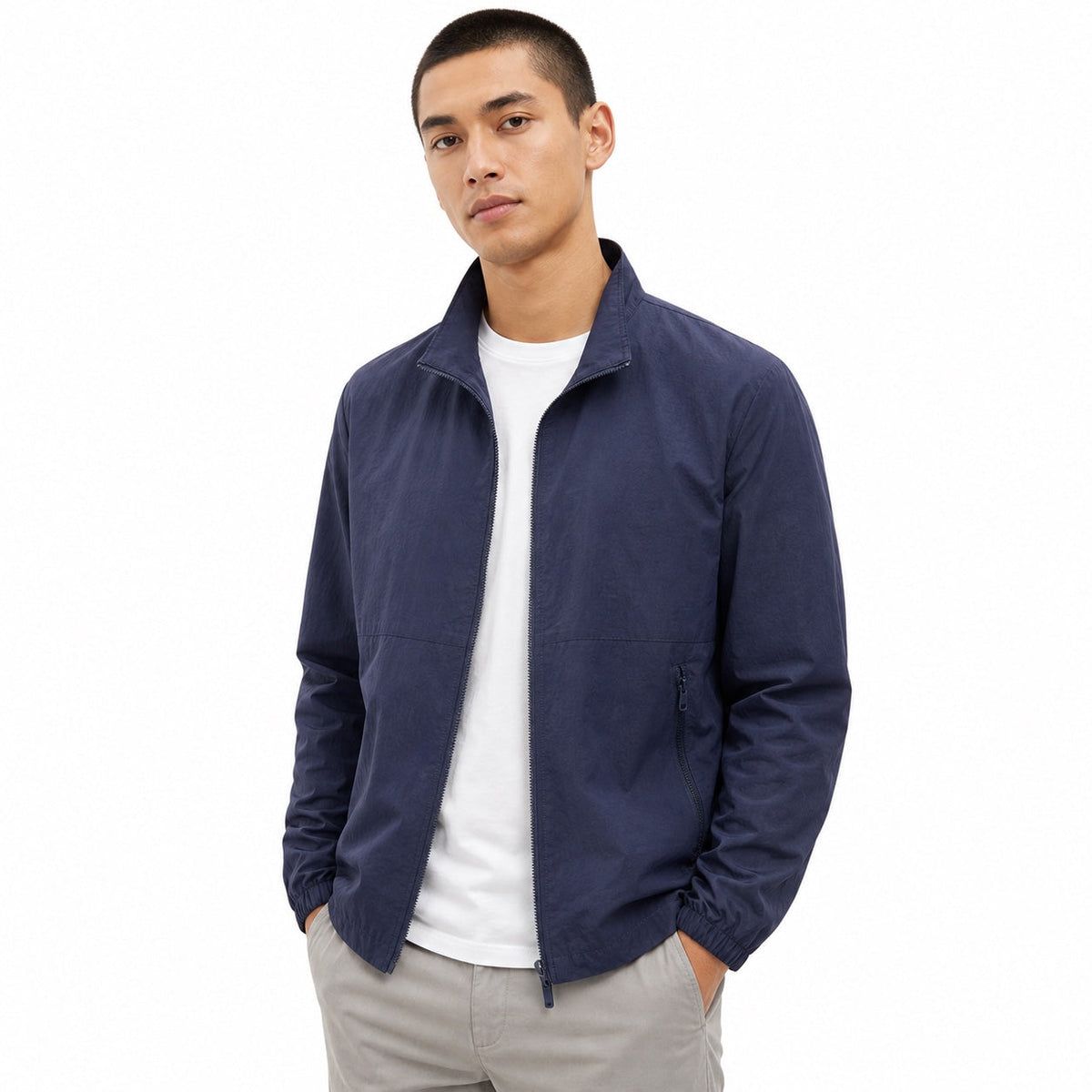 Men's plain windbreaker jacket with stand collar, long sleeves and zipped pockets