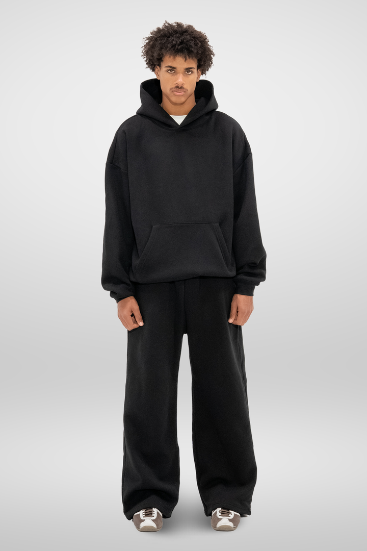 Black fleece sweatpants with a casual full-length cut