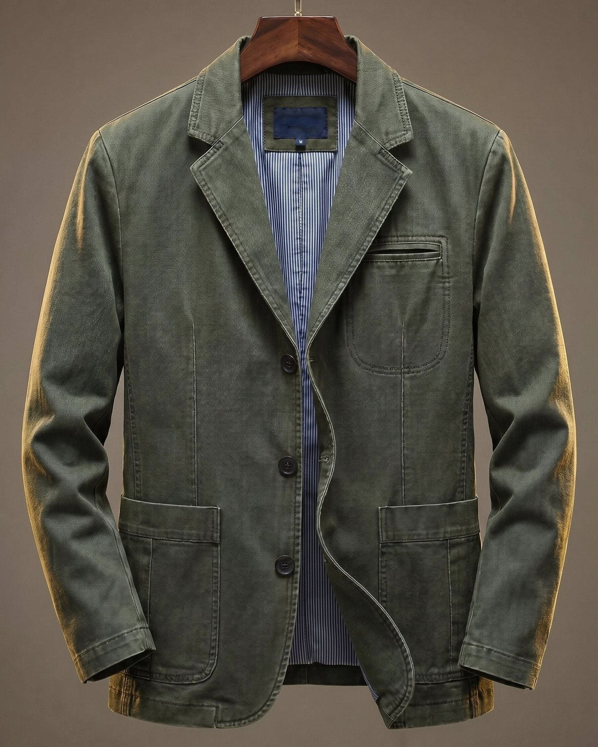 Washed blazer with notched lapels, button front, long sleeves and patch pockets
