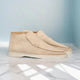 Men's slip-on loafers with stitched moccasin detailing and flat contrasting soles