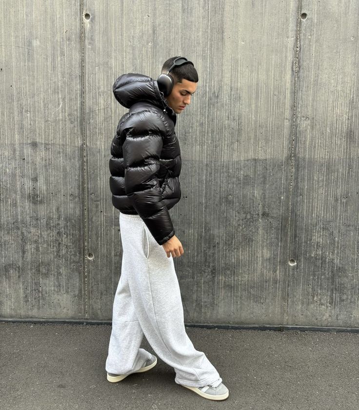Men's hooded quilted puffer jacket with zip front and side pockets