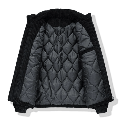 Ribbed padded jacket with high collar, zip front and zipped pockets