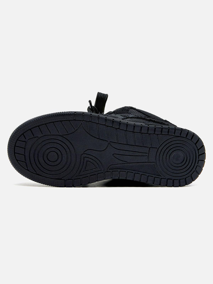 Black high-top sneakers with laces, camouflage side detail and rubber soles