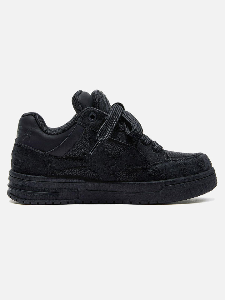 Black high-top sneakers with laces, camouflage side detail and rubber soles