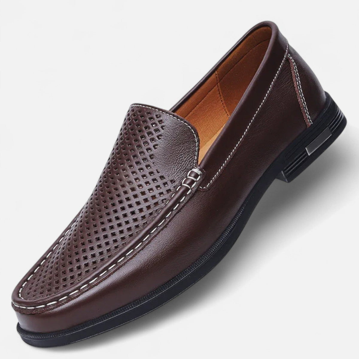 Men's perforated slip-on loafer with moc toe stitching and low heel