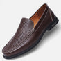 Men's perforated slip-on loafer with moc toe stitching and low heel