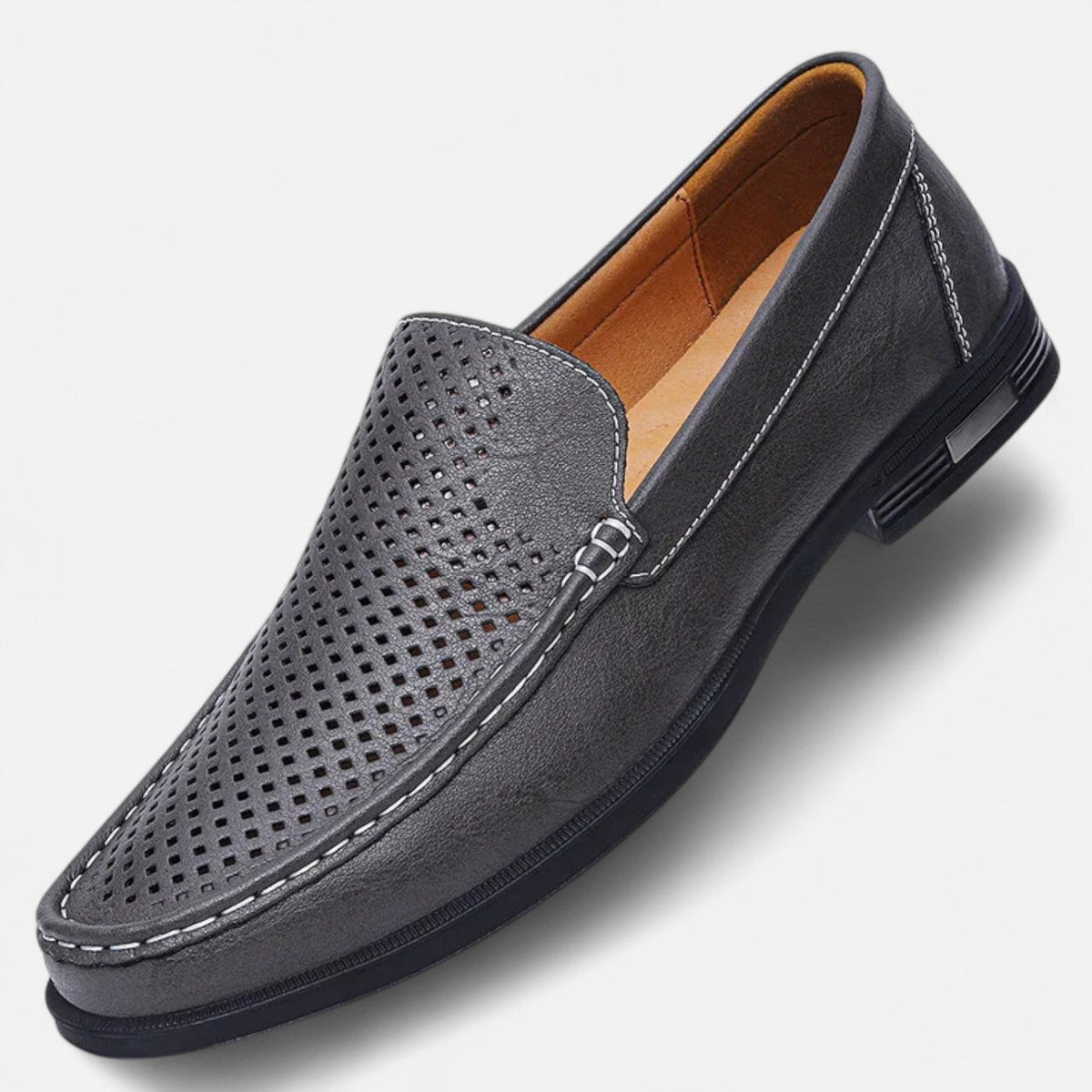 Men's perforated slip-on loafer with moc toe stitching and low heel