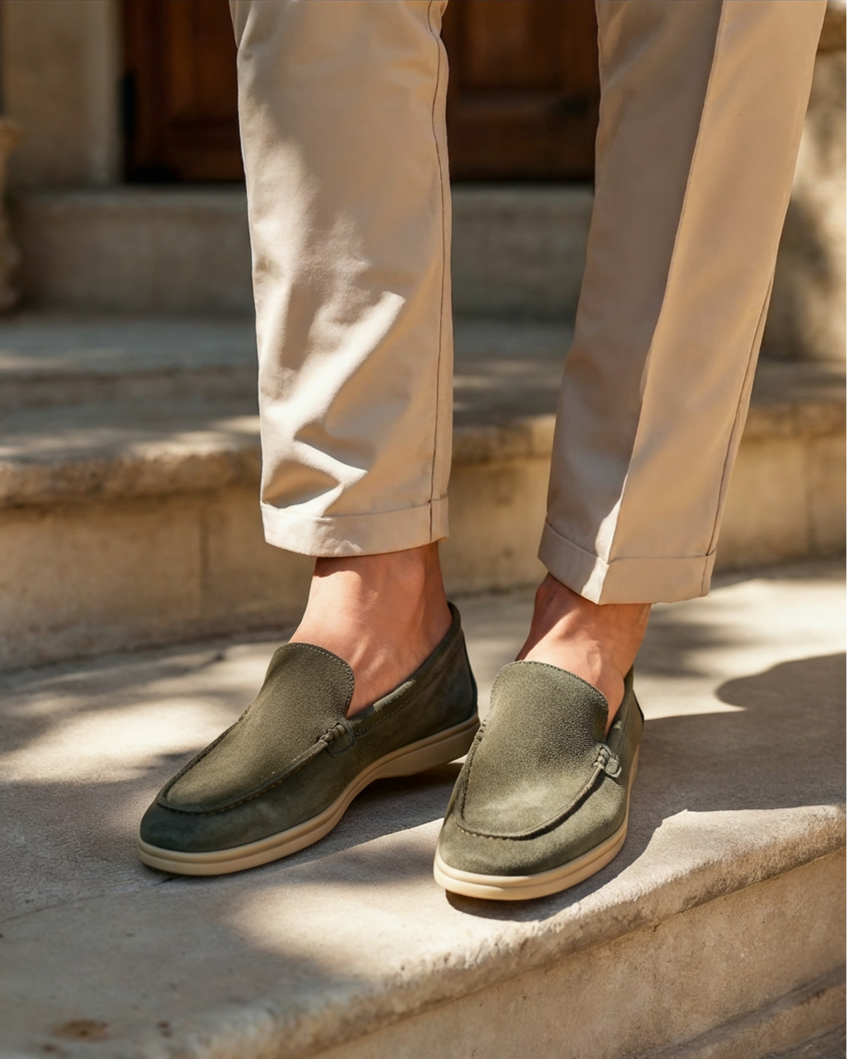 Unisex slip-on loafers with moccasin stitching and low heels