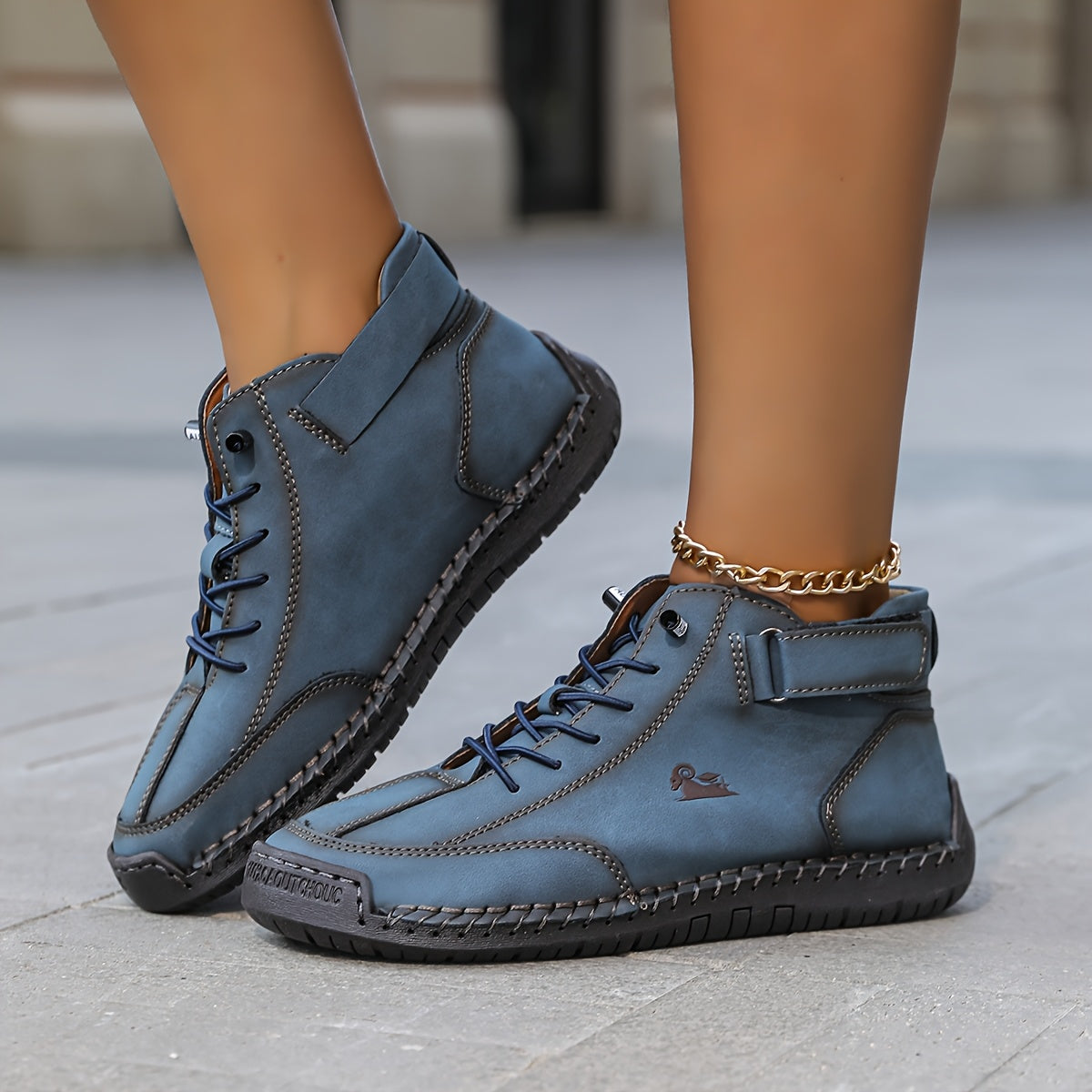 Ankle high lace-up sneakers with stitched panels, ankle strap and contrast sole