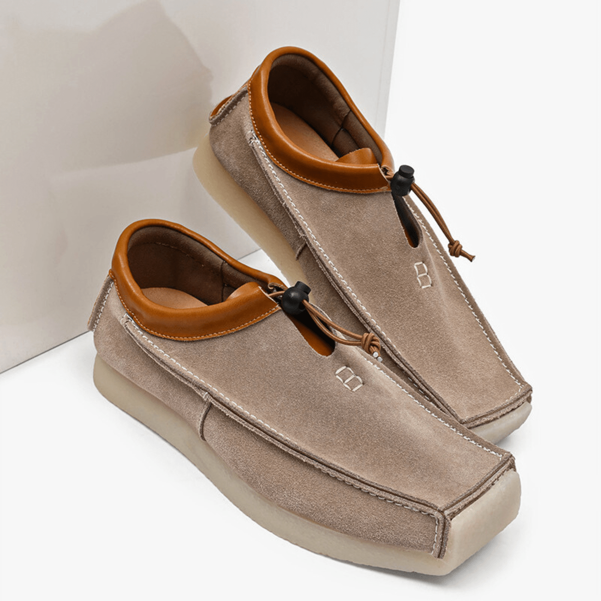 Square-toe loafers with toggle lace detail and flat soles