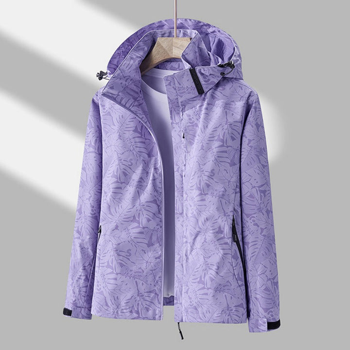 Women's leaf print hooded jacket with zip front and side pockets