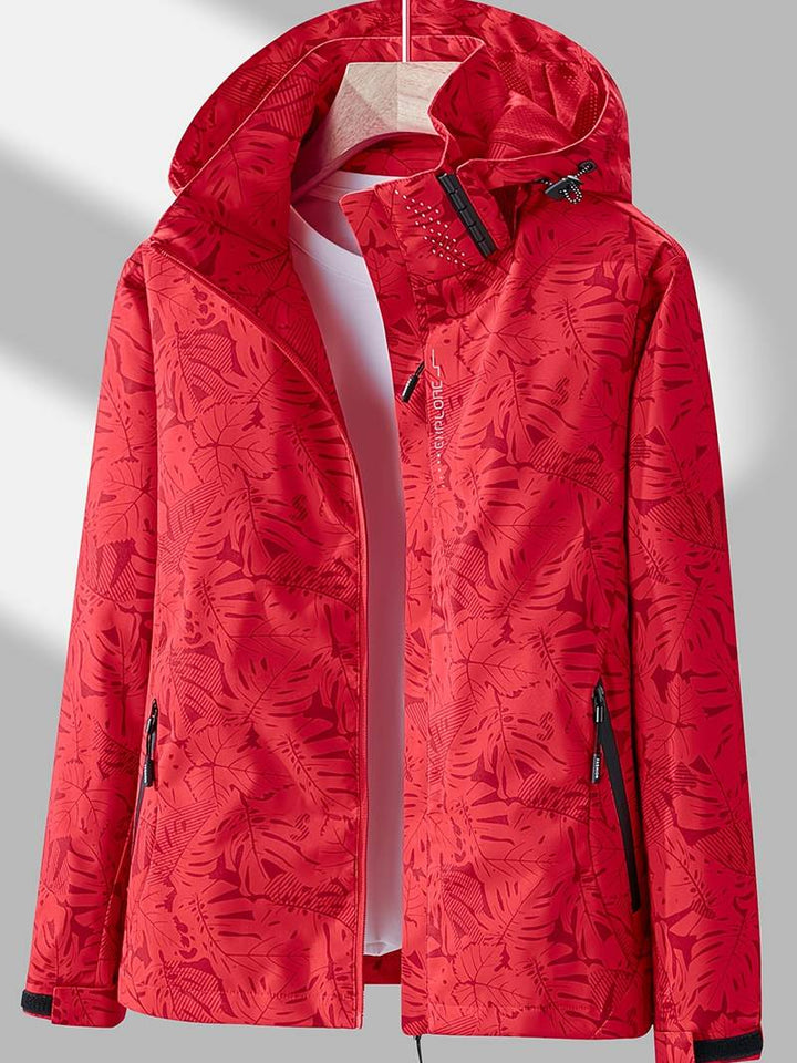 Women's leaf print hooded jacket with zip front and side pockets