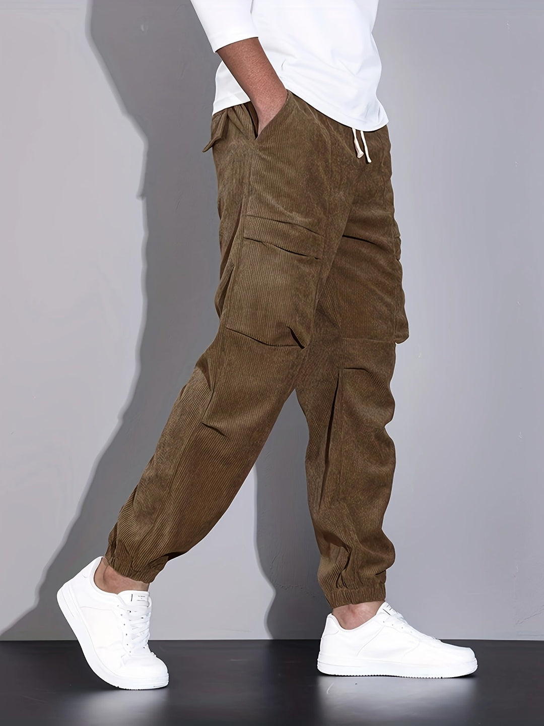 Men's corduroy cargo trousers with tapered legs and elasticated cuffs