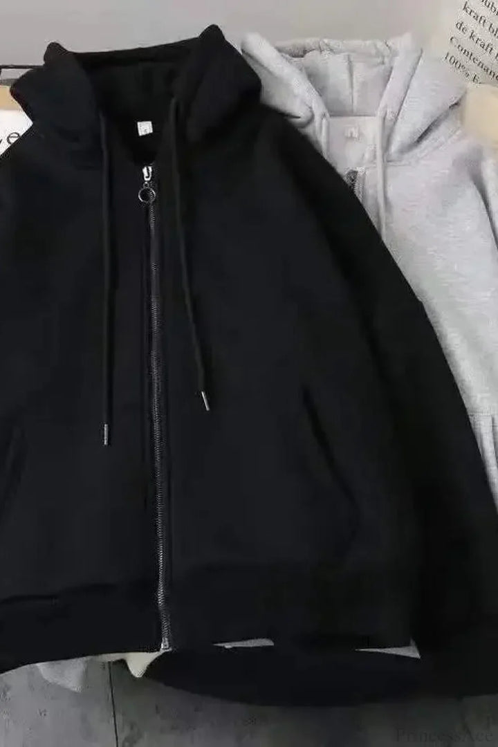 Unisex padded zip hoodie with attached hood and long sleeves