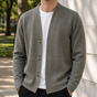 Men's long-sleeve V-neck knit cardigan with button front and contrast stitch detailing