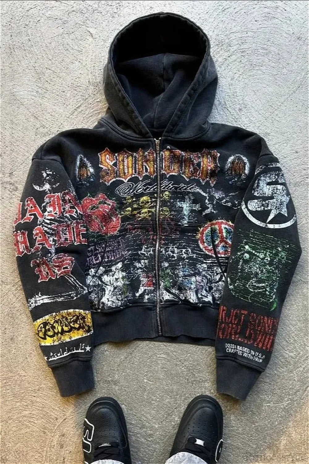 Unisex graphic zip-up hoodie with hood and printed streetwear artwork