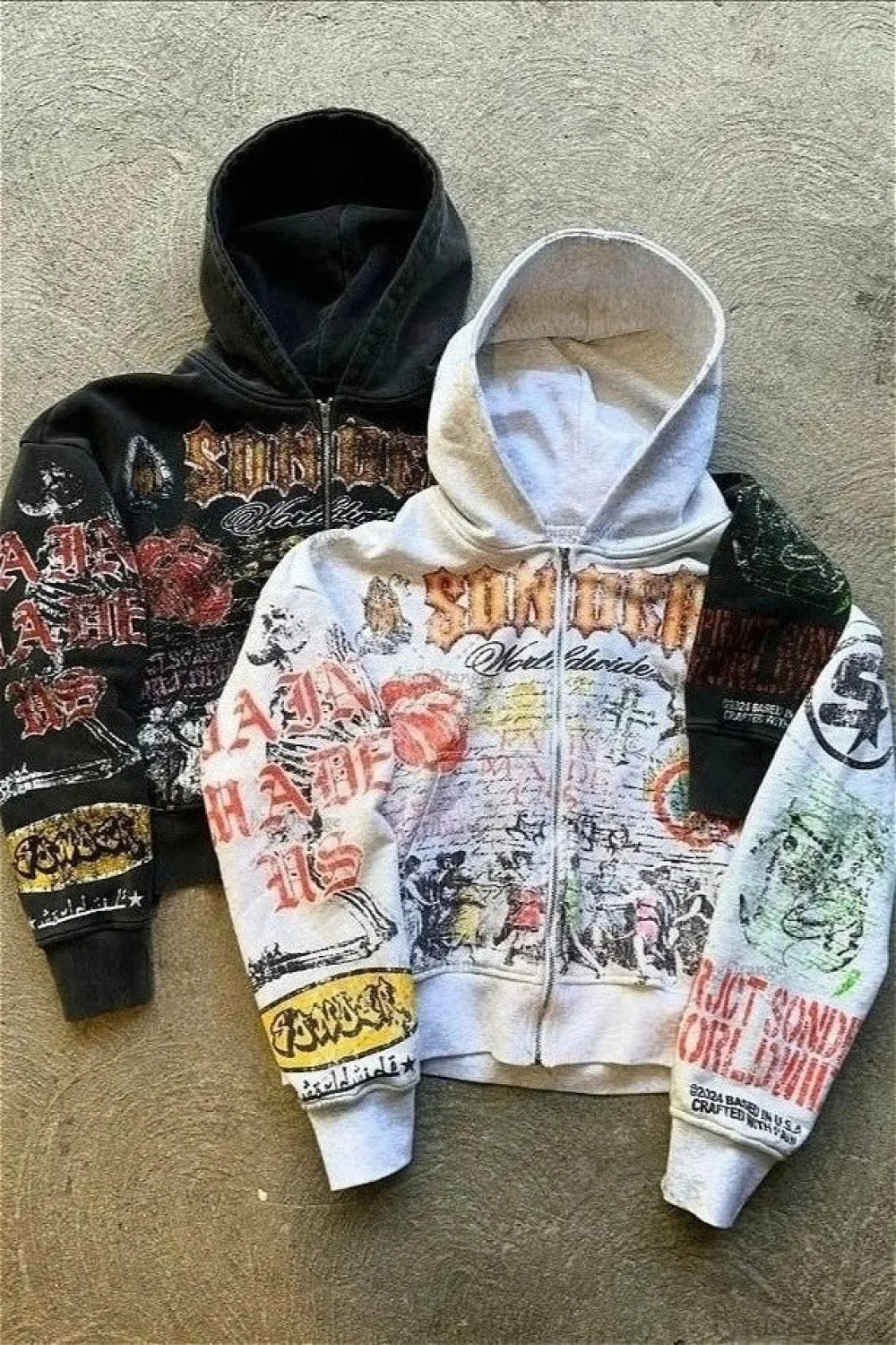 Unisex graphic zip-up hoodie with hood and printed streetwear artwork