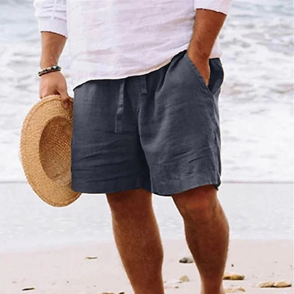 Men's relaxed fit shorts with drawstring waist, shown in tan and navy