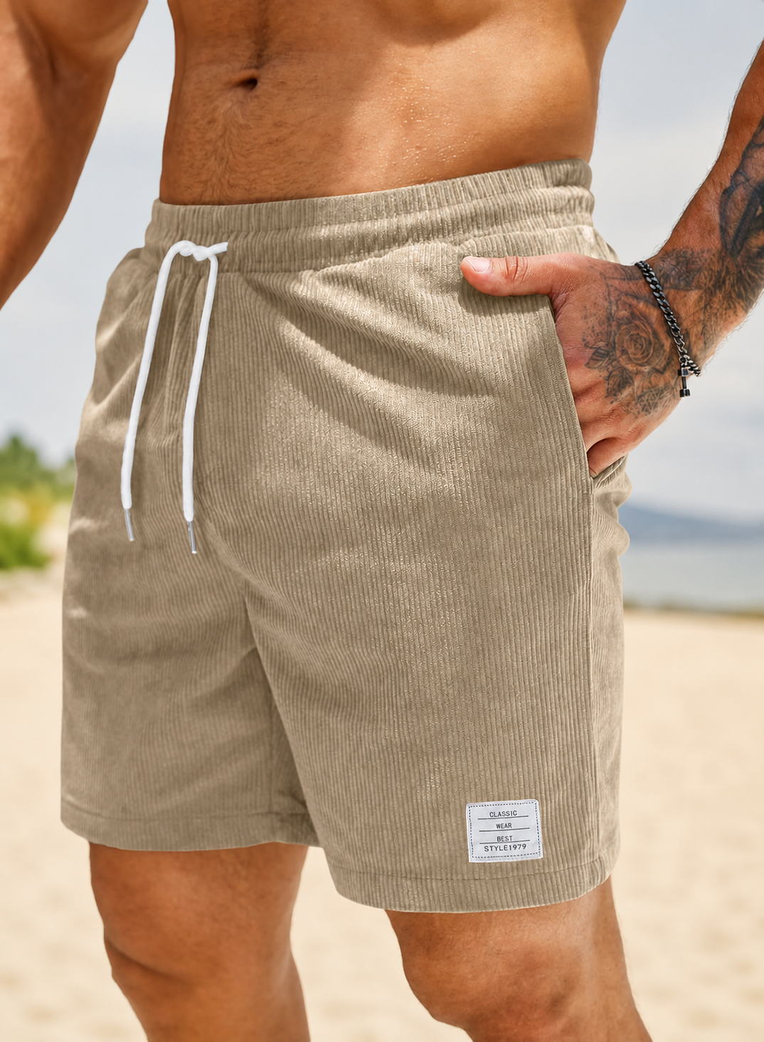 Men's relaxed fit shorts with elastic waist and drawstring, shown in green and beige