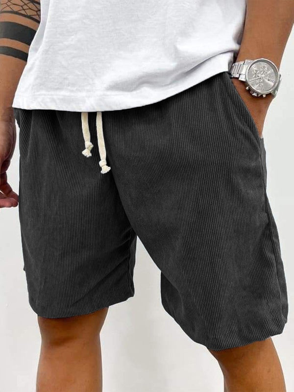Men's casual shorts with vertical stripe texture, fitted thigh, and cream drawstring