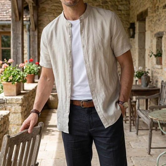 Men's beige short sleeve stand collar shirt with button front, flat lay view