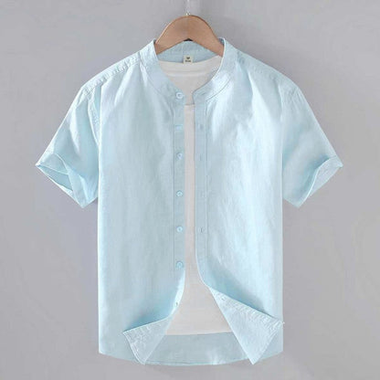 Men's beige short sleeve stand collar shirt with button front, flat lay view