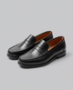 Men's slip-on loafers with moc toe stitching and penny strap detail