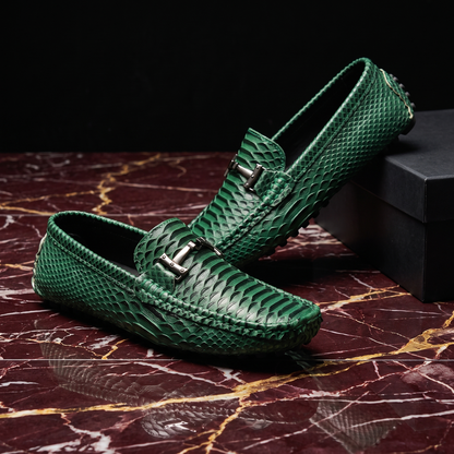 Textured loafers with metal buckle details and rounded toes