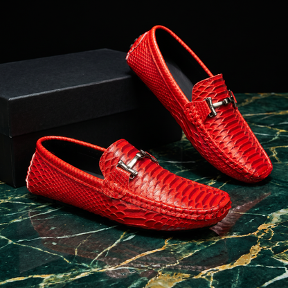 Textured loafers with metal buckle details and rounded toes