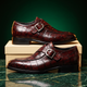 Crocodile pattern loafers with buckle straps and low heels