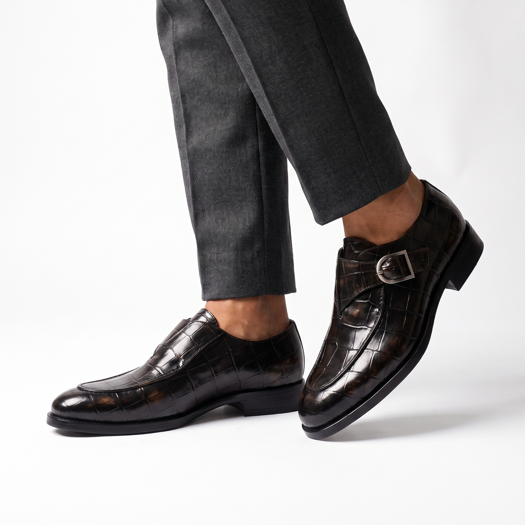 Crocodile pattern loafers with buckle straps and low heels