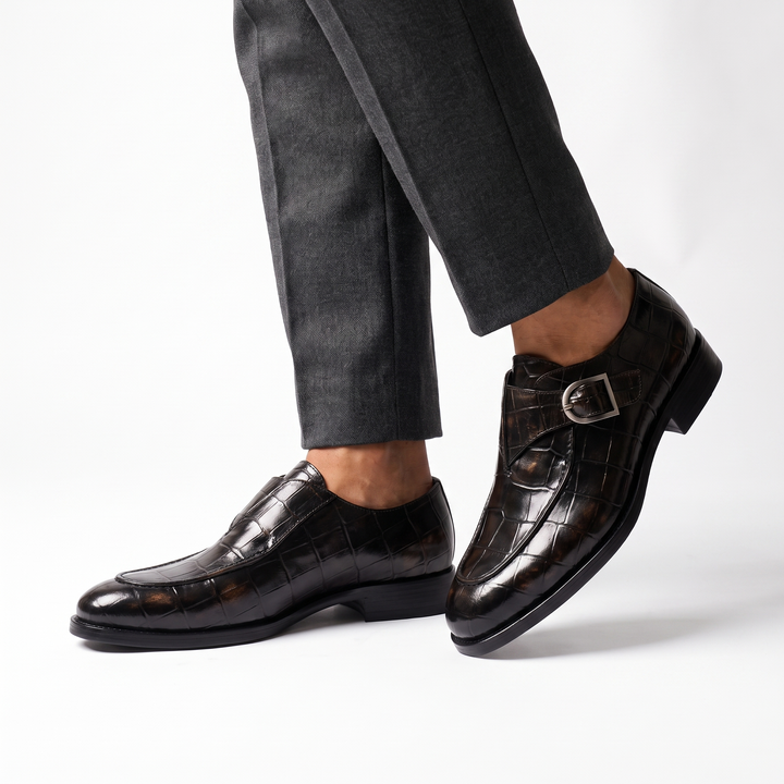 Crocodile pattern loafers with buckle straps and low heels