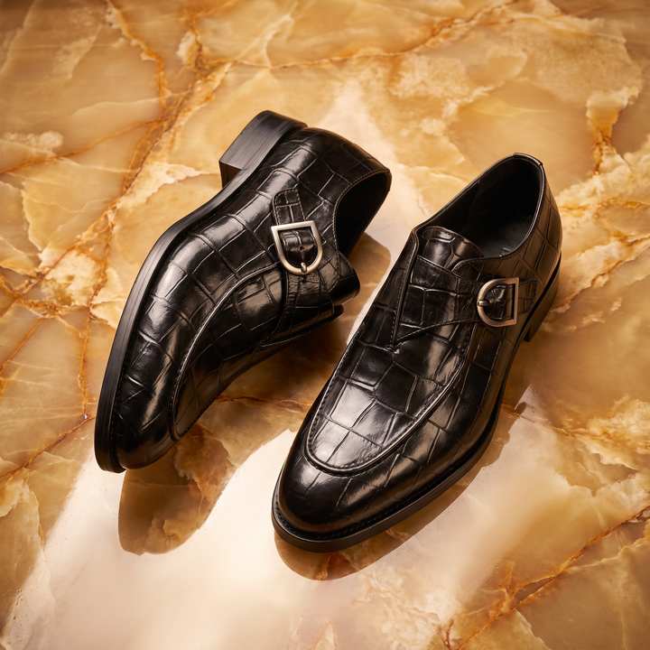 Crocodile pattern loafers with buckle straps and low heels