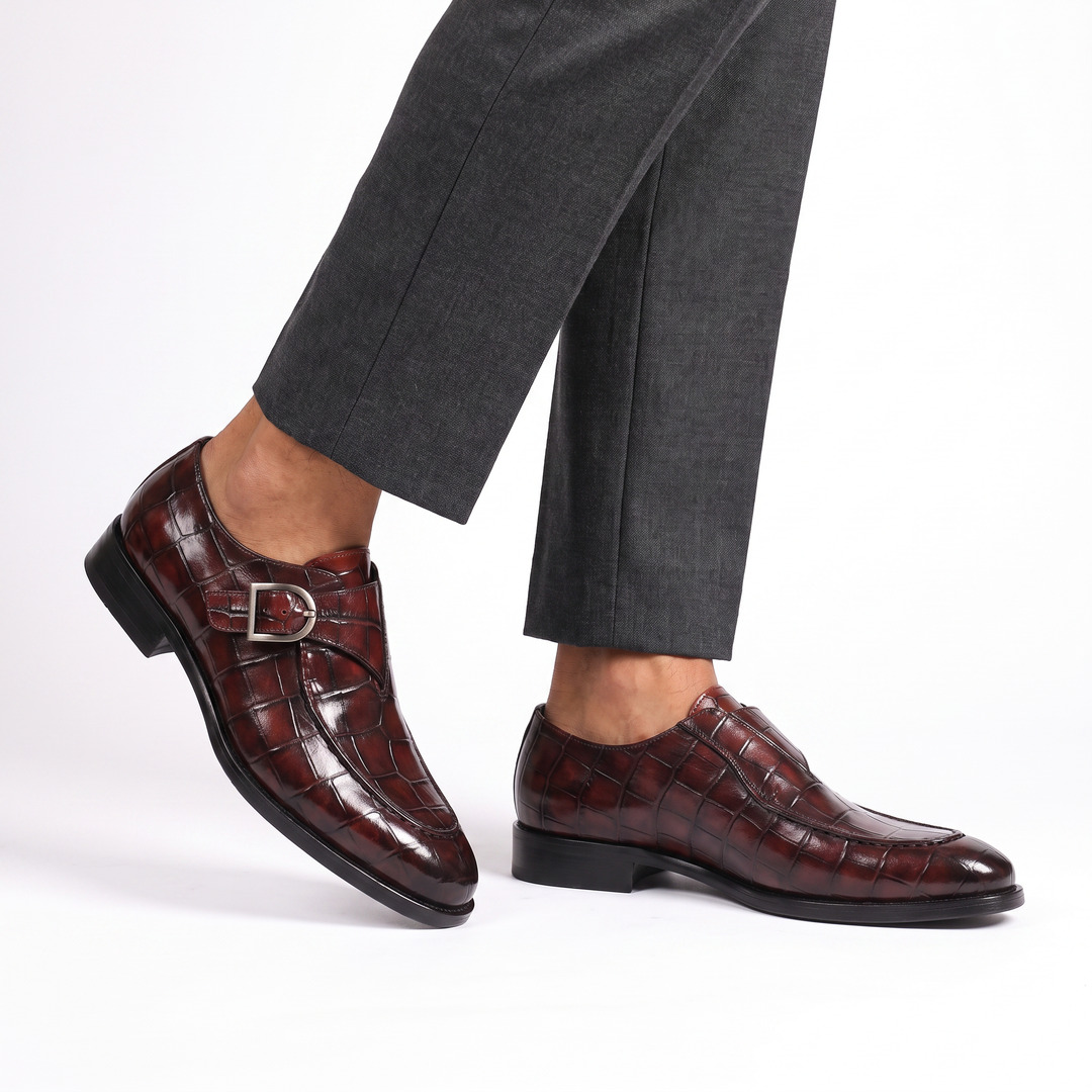 Crocodile pattern loafers with buckle straps and low heels