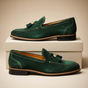 Men's slip-on loafers with tassel detail, moc toe stitching and low block heel