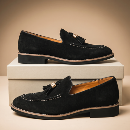 Men's slip-on loafers with tassel detail, moc toe stitching and low block heel