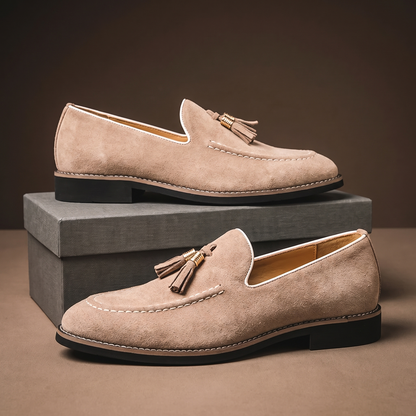 Men's slip-on loafers with tassel detail, moc toe stitching and low block heel