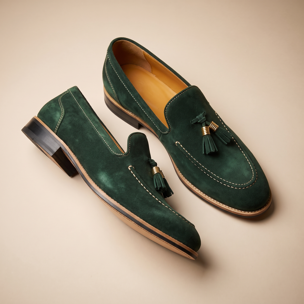 Men's slip-on loafers with tassel detail, moc toe stitching and low block heel