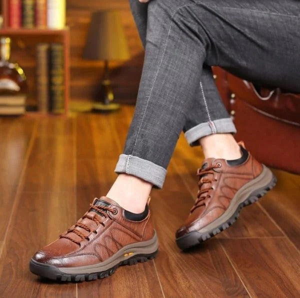 Men's black leather lace-up orthopedic shoes with cushioned midsole and treaded sole