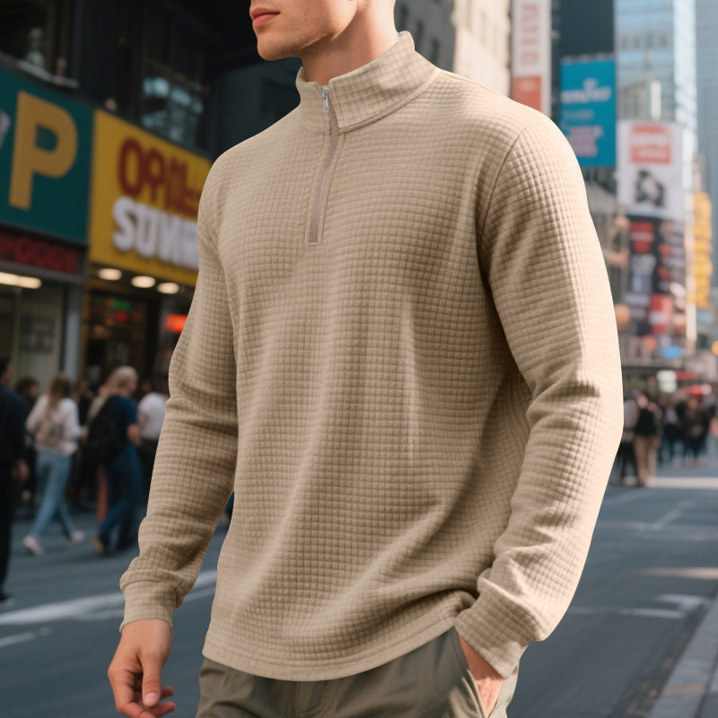Men's textured half-zip sweatshirt with a high mock neck and long sleeves